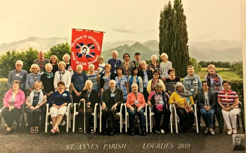 Flying the Salesian Cooperators' GBR flag in Lourdes